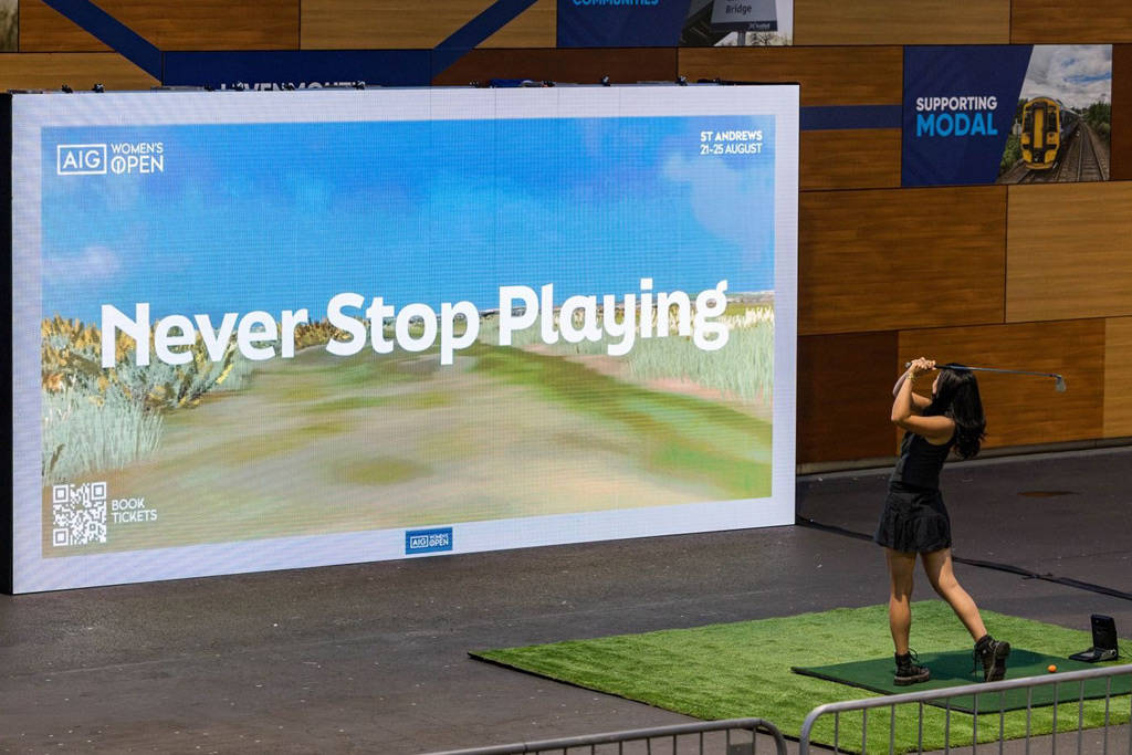 The playable golf billboard at Edinburgh Waverley station